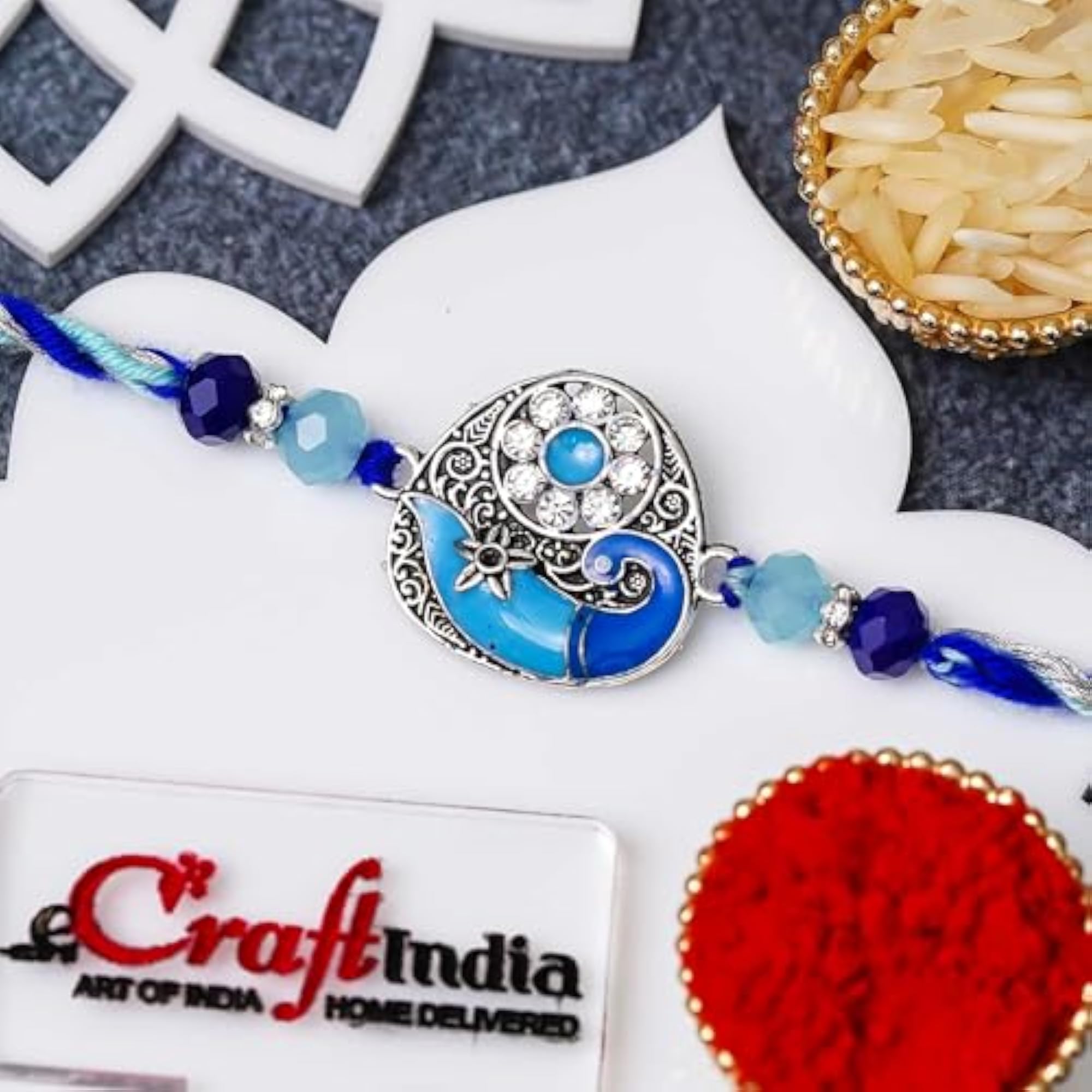 Blue Designer Peacock Rakhi for Brother with Gift Combo Set